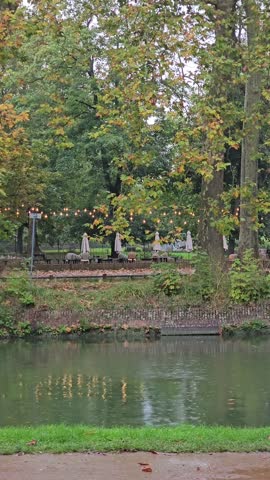 People Walking and Jogging in Parc de la Citadelle on a Peaceful Autumn Day - Lille, France