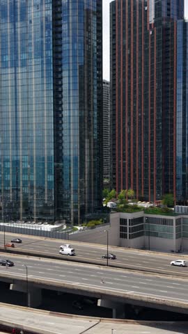 Chicago USA, Vertical Drone Shot of Modern Condominium Complex Along Lakeshore Drive and Riverwalk