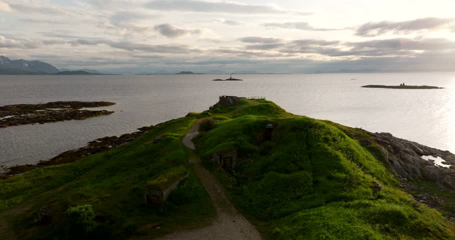Sunset aerial view over World War 2 ruins at Skrolsvik Fort, Senja, Norway