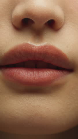 Close up silence hush gesture unrecognizable Asian woman showing secret sign female mouth Chinese girl unknown lady lips silent symbol quite secrecy private confidential information forbidden chatter