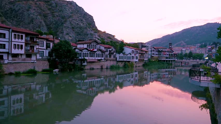Historical Ottoman Houses Along Yesilirmak River in Amasya, Turkey at Sunrise
