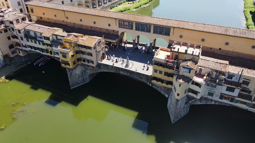 Drone cinematic shot Ponte Vecchio Florence Italy cultural heritage landmark