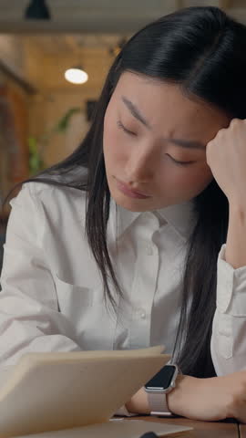 Stressed overworked tired Asian business woman Korean girl worker at office sad burnout boring worried businesswoman upset Chinese female manager thinking problem solution thoughtful Japanese lady job
