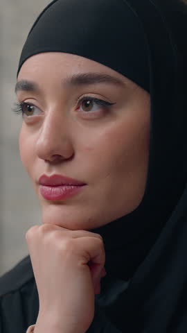 Pensive happy Arabian muslim woman businesswoman business portrait smiling Islamic girl female positive face beautiful corporate worker lady in hijab thoughtful thinking looking at camera in office