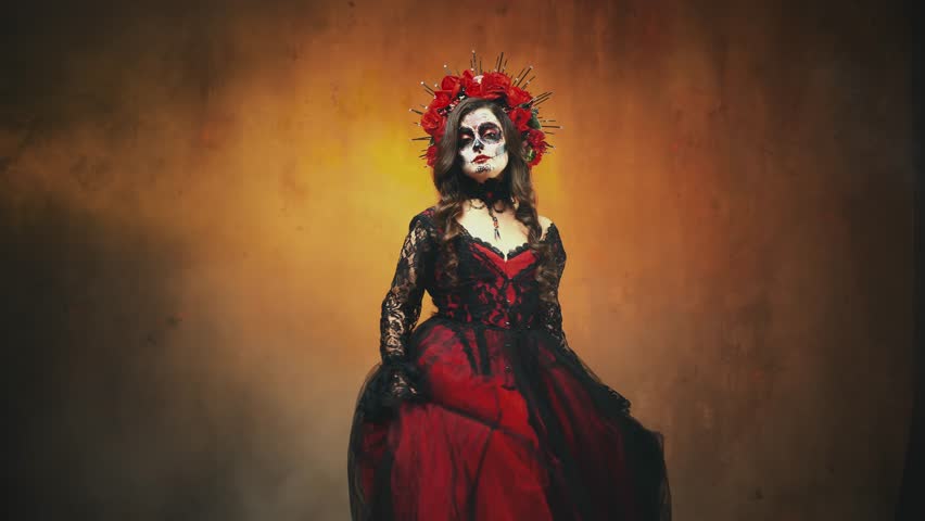 young woman sugar skull art carnival make-up face roses on head, dark long hair black lace dress waving in dance motion. Halloween costume holiday. Sexy Girl Calavera, day of the dead santa muerte 4k.