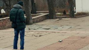 Person operator man initiates takeoff and controls the drone quadcopter during flight - Powered by Shutterstock - Get 15% off with code: PIKWIZARD15