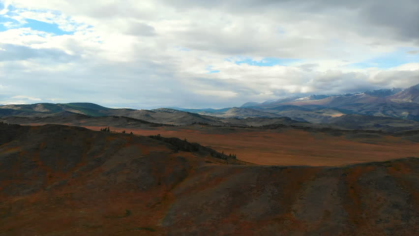 Autumn colors painting the alaskan mountain range. Media