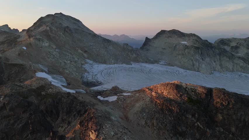 Majestic Mountain Landscape with Expansive Glacier During Sunset in British Columbia, Canada