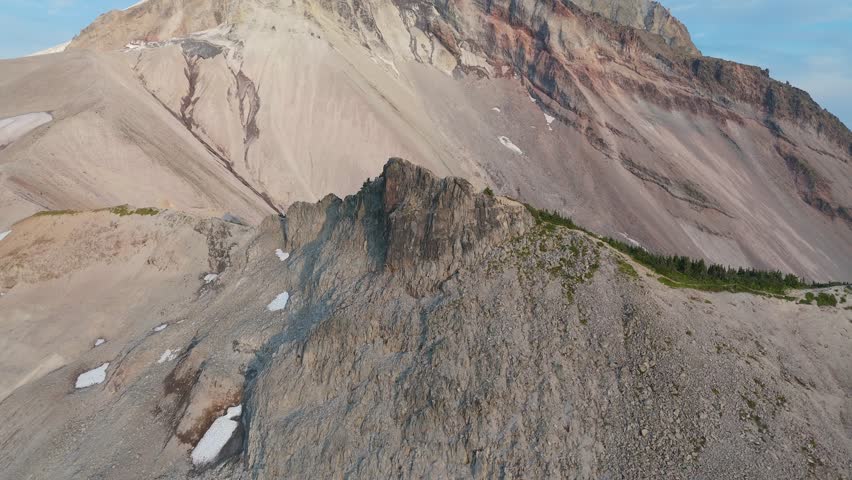 Majestic Mountain Peaks and Rugged Landscape in British Columbia, Canada Under a Clear Sky