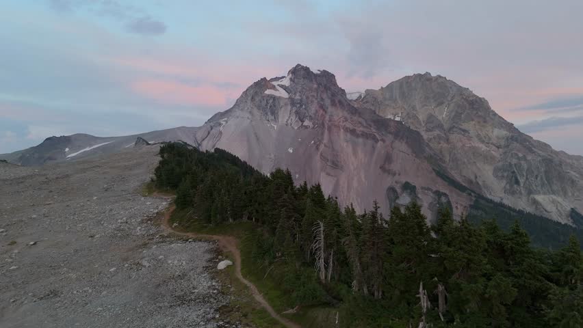 Majestic Mountain Peak and Serene Wilderness Trail at Dusk in Beautiful BC, Canada