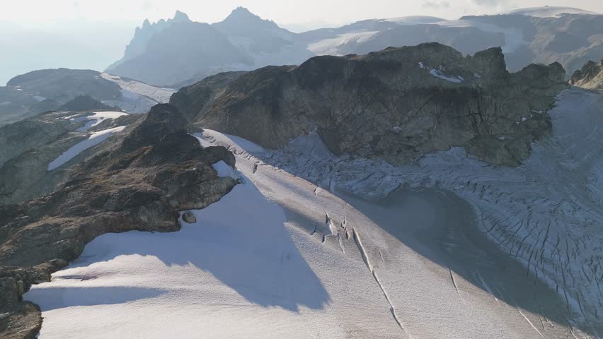 Majestic Aerial View of Snow-Capped Mountains and Glacial Landscape in British Columbia, Canada