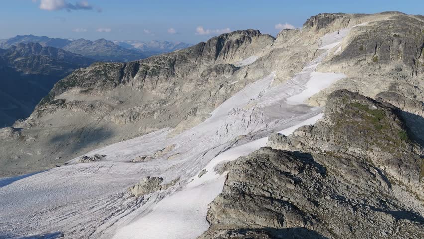 Aerial View of Majestic Glaciers and Rugged Mountain Peaks in Beautiful British Columbia, Canada