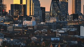 London skyline at sunset, illuminated skyscrapers, office buildings, urban landscape of city financial district. Rise up panorama, night evening cityscape modern architecture. England, United Kingdom - Powered by Shutterstock - Get 15% off with code: PIKWIZARD15