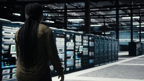 Programmer overseeing high tech server farm, ensuring compliance with industry standards. Data center IT professional conducts security audits to protect against cyber threats and glitches, camera A - Powered by Shutterstock - Get 15% off with code: PIKWIZARD15