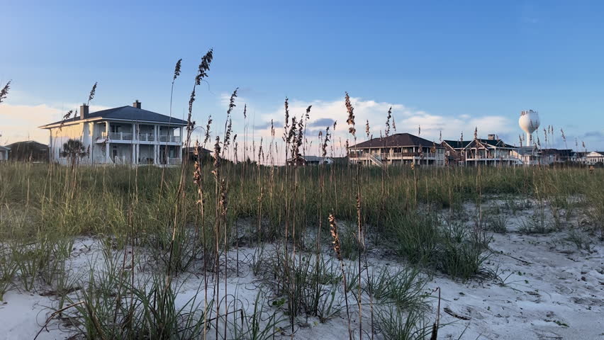 Beach Houses in Wilmington, NC at Sunset, with Sandy Dunes and Grass