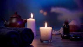 Night Spa Ambiance with Warm Candle Glow and Essential Oils - Powered by Shutterstock - Get 15% off with code: PIKWIZARD15