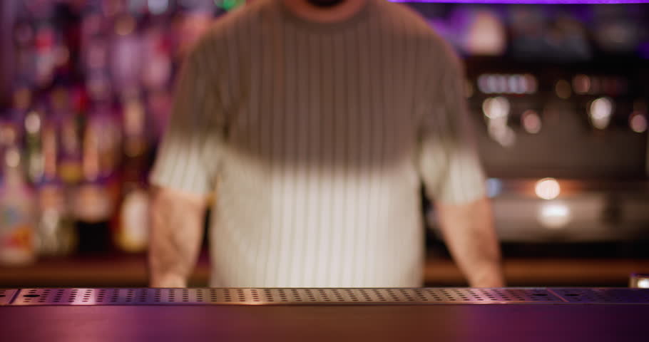 Sake cup. Serving alcoholic drink. Barkeeper putting on counter little empty clay bowls for traditional asian beverage. Ceramic dishes rice wine.