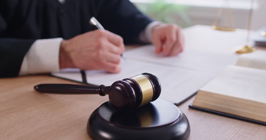 Trial, final decision, law court judge, gavel wooden hammer close up bangs to sentence in court, accuse guilty, proclamation, passes judgment, hitting on table to get attention, punctuate rulings