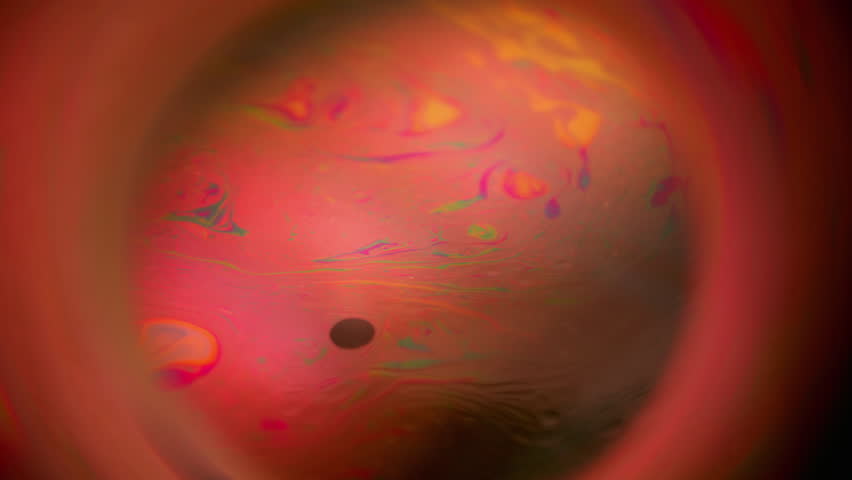 Blur paint swirl. Circle space energy. Globe red pink color light whirl. Abstract oil flow luminosity orange round lens background.