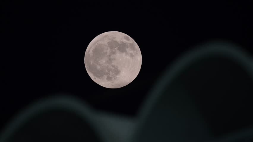 Close-up view of the Supermoon shining over the night sky in the GCC.