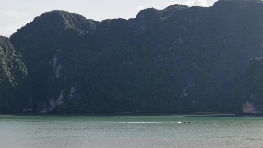 A small fishing boat in the middle of the sea