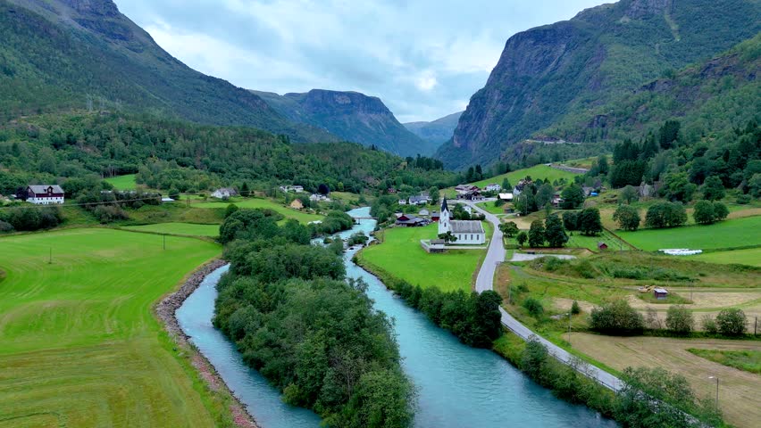 Nestled in the heart of the Sognefjord region, Fortun boasts stunning landscapes featuring lush green hills and serene rivers of Route 55 Vestland Norway