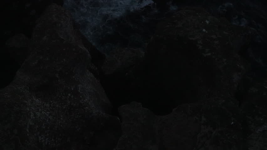 rugged rock formation of Peniche peninsula with high cliffs near Varanda de Pilatos in Portugal during dusk.