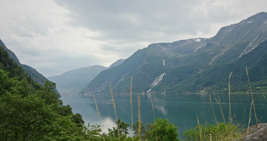 Norway Fjord with Waterfalls and Mountains – Serene Cloudy Landscape