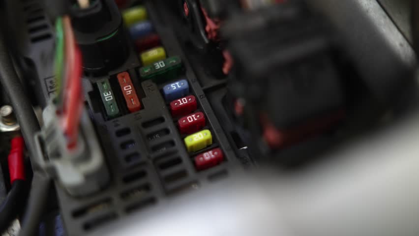 Looking at the fuse box of a car