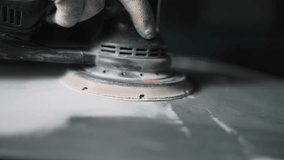 Auto mechanic grinds car part for painting. Car body work auto repair paint after accident - Powered by Shutterstock - Get 15% off with code: PIKWIZARD15