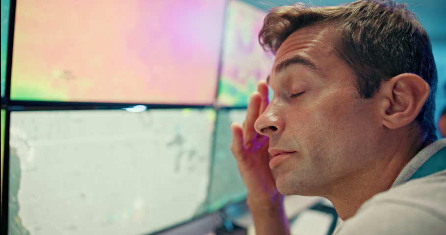 Computer, tired man and eye strain in office for meteorology, exhausted and burnout on deadline. Stress, fatigue and meteorologist monitor weather forecast, climate change science and satellite map