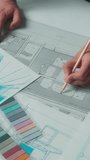 Closeup architecture design project blueprint business team Arabian man architect designer writing notes talking with muslim women in hijab three office partners discuss interior drawing building plan - Powered by Shutterstock - Get 15% off with code: PIKWIZARD15