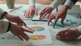 Close up papers documents data in office unrecognizable business team review paperwork stats diagrams graphs financial results corporate sales coworkers architects contractors teamwork blueprint plan - Powered by Shutterstock - Get 15% off with code: PIKWIZARD15