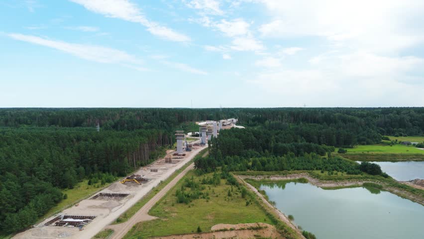 Endless construction site of Rail Baltica bridge in Lithuania, aerial panoramic view