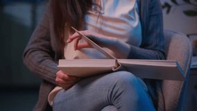 Caucasian woman thinking looking photo album watching book memories dreaming pictures catalog collection alone at home apartment night evening smiling girl female relax watch scrapbook mental emotions - Powered by Shutterstock - Get 15% off with code: PIKWIZARD15