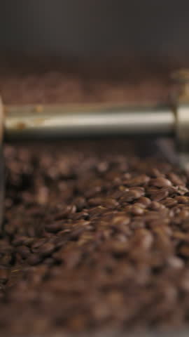 Coffee roasting machine hot beans roasted blend mix caffeine factory close up roaster automate circle blending processing grains roast at coffeehouse manufacture fresh aroma espresso cocoa texture