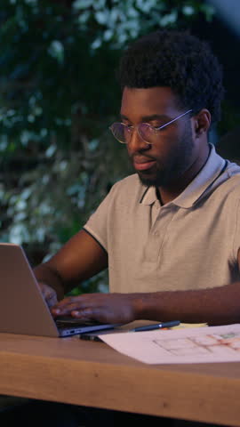 African American architect business man laptop work overtime in night office tired businessman overwork exhausted male guy discomfort evening take off glasses suffer eyesight head ache dry eyes health