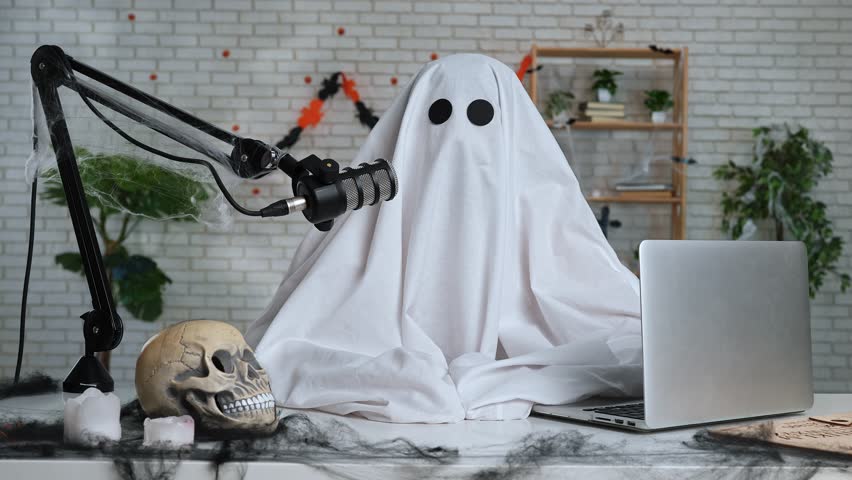 Halloween Ghost Podcast or Blog setup with Microphone and Laptop