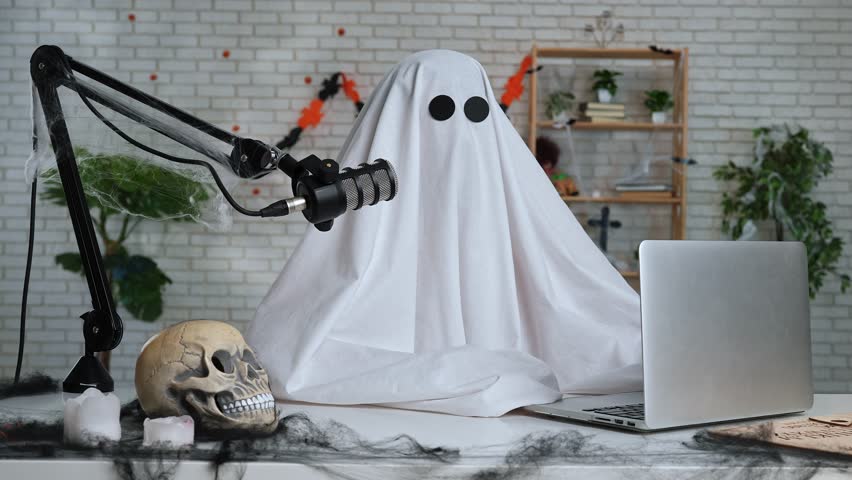 Halloween Ghost Podcast or Blog setup with Microphone and Laptop