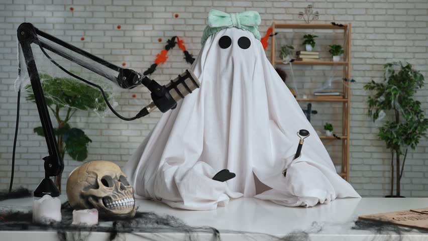 Halloween Ghost Host in Home Studio Setup with Guasha Scraper