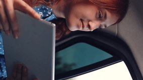 girl tablet car face smile window, student using tablet, distant travel dreams, vacation relaxation ride, focused tablet study, car trip learning, digital learning journey, e-learning on road, digital - Powered by Shutterstock - Get 15% off with code: PIKWIZARD15