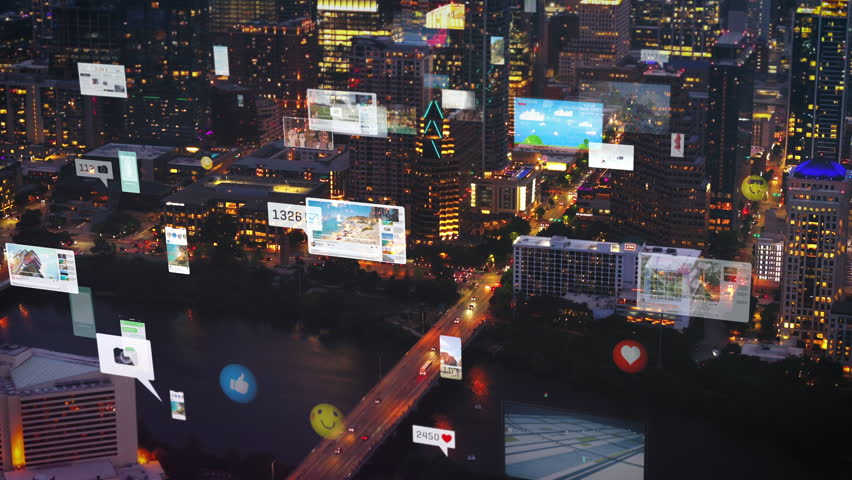 Aerial view of Austin, Texas at night with a digital overlay of social media content, concept of smart city and the future of technology - Powered by Shutterstock - Get 15% off with code: PIKWIZARD15