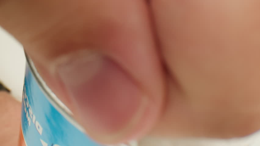 Crispy potato chips close up pack in macro. Golden fried potatoes close up. Potato snack for unhealthy fast food. 