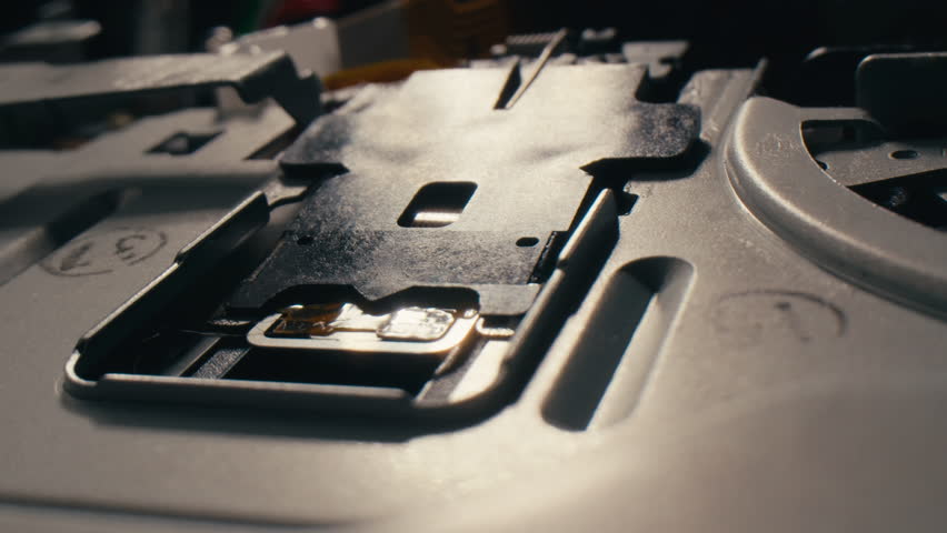 Floppy disc FDD close up, Using diskette for old PC computer macro. Archive programme or Music recorder, playing retro computer games. Vintage device for office, obsolete technology. 