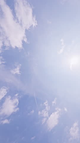 Airplane flying close overhead coming in to land in barcelona airport in vertical