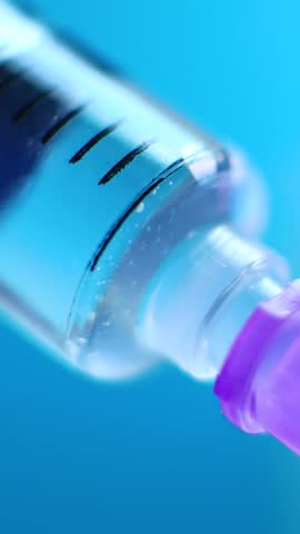 Medical professional injects medication using syringe. Ensures precise dosing in hospital treatments. Used in emergency medicine, post surgical recovery, ongoing patient care in healthcare facilities