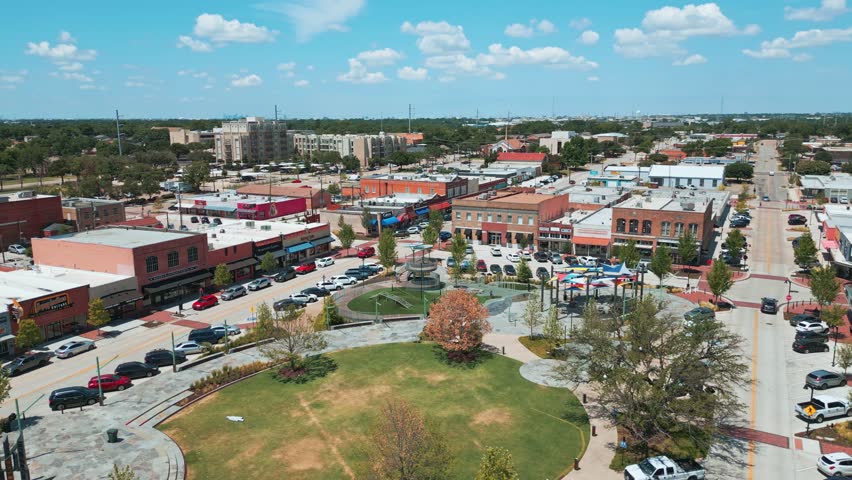 Aerial of Garland Texas city square with shops and restaurants. 