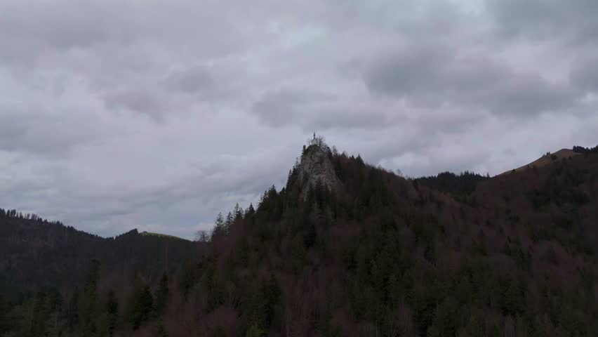 Riedersteinkapelle uber Tegernsee. Riederstein chapel small neo-Gothic church on cliff above Lake Tegernsee in Bavaria, Germany. Small white church on cliff in Alps. Aerial view Riederstein Kapelle. 