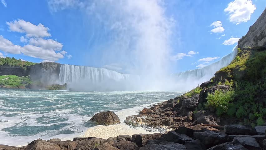 Niagara Falls waterfall with rocks and mist, Ontario, Canada