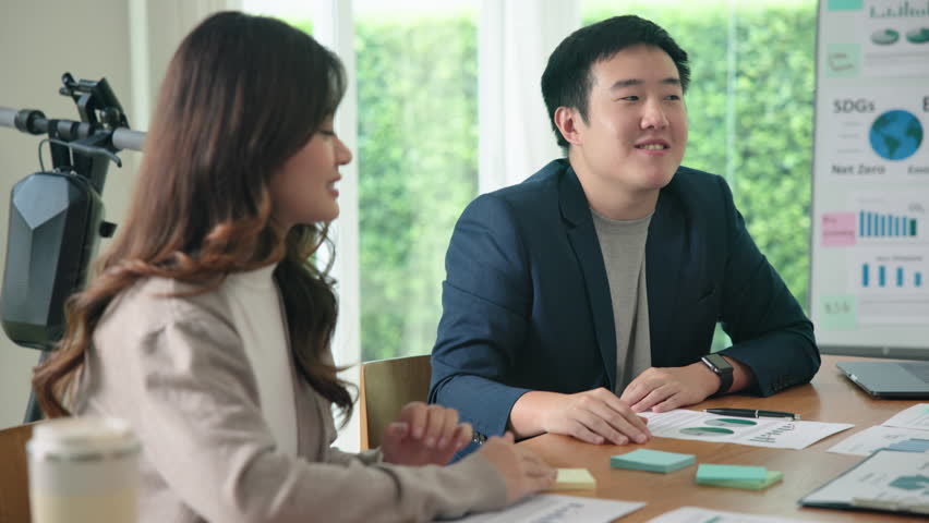 Happy workplace diverse team group young adult gen Z asia people man woman candid work at office class enjoy talk laugh relax idea advice in go green eco friendly future growth worker mental health.